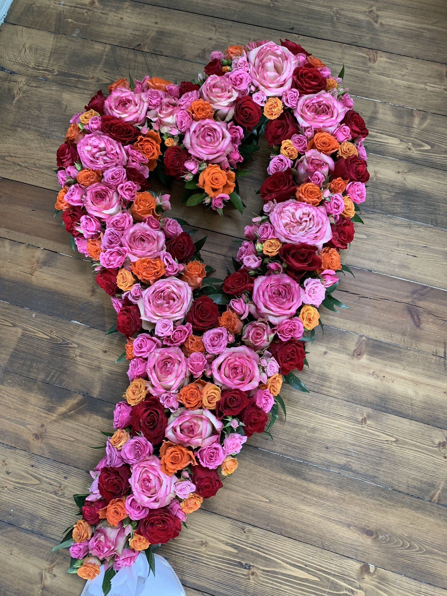 Begravelsesbukett, varme farger